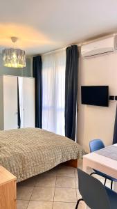 Llit o llits en una habitació de New Apartment with Terrace