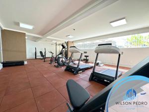 a gym with several exercise bikes in a room at Spazzio diRoma in Caldas Novas