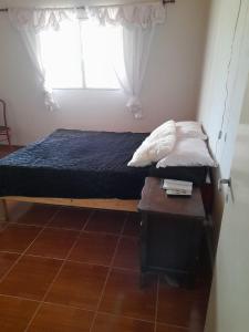 Ένα ή περισσότερα κρεβάτια σε δωμάτιο στο rafaella