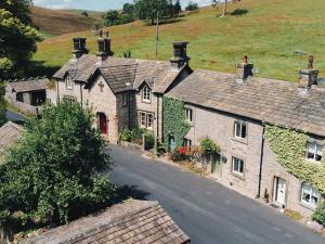 an overhead view of a group of houses on a road at Ivy Cottage - Uk42246 in Broughton