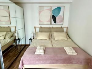 Ένα ή περισσότερα κρεβάτια σε δωμάτιο στο River Passage Budapest Garage/AC/Balcony