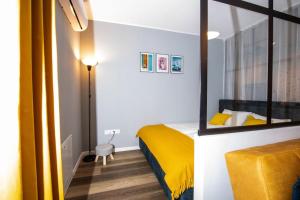 Ліжко або ліжка в номері Lisabona apartment