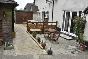 A porch or other outdoor area at Flossies B and B 