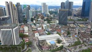 an aerial view of a city with buildings and traffic at Marmaid Suite At Barjaya Time Square KL in Kuala Lumpur