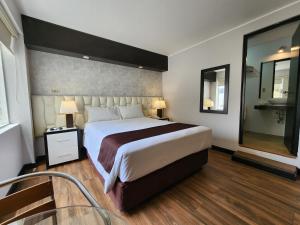 Katil atau katil-katil dalam bilik di Hotel Ferré Miraflores
