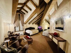 TV a/nebo společenská místnost v ubytování Hotel Malpensa INN Aereoporto