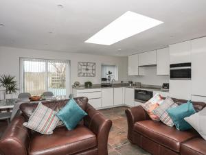 Kuchyň nebo kuchyňský kout v ubytování Bryn Llwyd Cottage