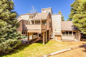 a large wooden house with a large yard at Payday by All Seasons Resort Lodging in Park City