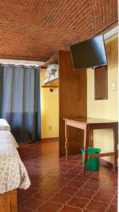 TV a/nebo společenská místnost v ubytování Posada La Mora - Hospedaje Panoramico