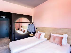 Postel nebo postele na pokoji v ubytování Ibis Styles Roma Aurelia