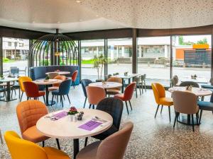 ibis Styles St Margrethen Bodensee餐厅或其他用餐的地方