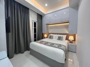 Postel nebo postele na pokoji v ubytování Safa Homestay + 37 fotografií