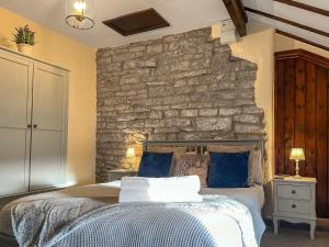 Ένα ή περισσότερα κρεβάτια σε δωμάτιο στο Sienna Cottage - W7764