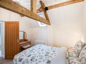 Ein Bett oder Betten in einem Zimmer der Unterkunft Northwood Farm Cottage