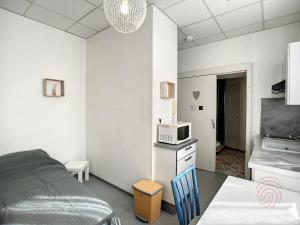 Posteľ alebo postele v izbe v ubytovaní Studio idéal, proche Thermes, Lamalou les Bains, calme, animaux acceptés, wifi - FR-1-451-179