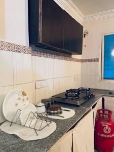 Köök või kööginurk majutusasutuses Shanthi Home Stay
