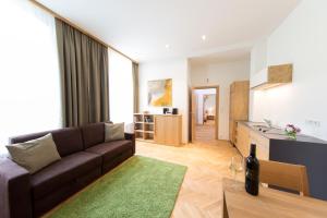 a living room with a couch and a table at Himmlisch Urlauben in Tieschen in Tieschen