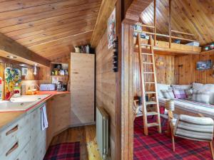 a kitchen with a ladder in a tiny house at Chalet Courchevel 1850, 4 pièces, 4 personnes - FR-1-564-97 in Courchevel