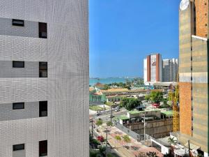 a view of a city from a building at Alessandra Residence | Meireles - CE in Fortaleza