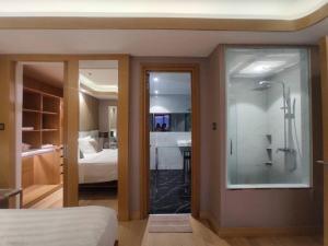 High Class 1BR at One Euphoria客房内的一张或多张床位