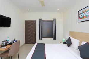 Super Townhouse Diamond View的电视和/或娱乐中心