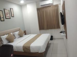 Katil atau katil-katil dalam bilik di Hotel Md Residency