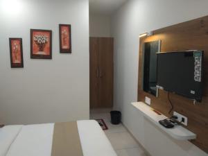 Televisyen dan/atau pusat hiburan di Hotel Md Residency