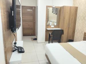 Televisyen dan/atau pusat hiburan di Hotel Md Residency