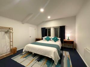 Łóżko lub łóżka w pokoju w obiekcie Atelier Hakuba