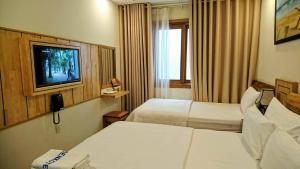 TV a/nebo společenská místnost v ubytování Senkotel Nha Trang Managed by NEST Group