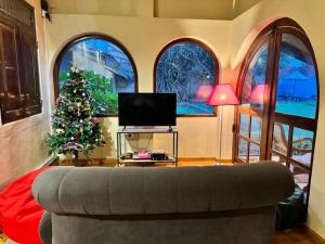 TV a/nebo společenská místnost v ubytování Isle of Thalpe