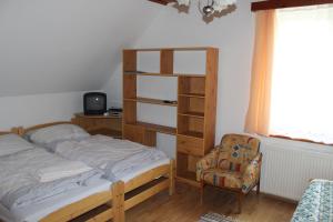 Posteľ alebo postele v izbe v ubytovaní Penzion Mühl