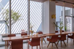 Restoran atau tempat makan lain di Wuyu Hotel Chongqing Zoo & Yangjiaping The Mixc Light rail