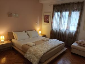 Posteľ alebo postele v izbe v ubytovaní Stunning apartment in the heart of Athens