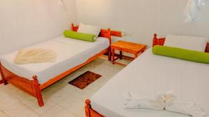 Letto o letti in una camera di Banana Rest Sigiriya