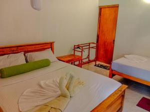 Letto o letti in una camera di Banana Rest Sigiriya