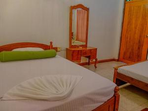 Letto o letti in una camera di Banana Rest Sigiriya