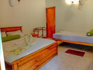 Letto o letti in una camera di Banana Rest Sigiriya