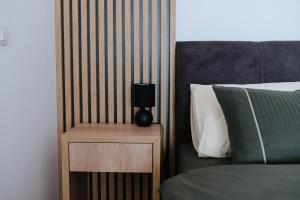 Ein Bett oder Betten in einem Zimmer der Unterkunft Apartman Aleksandar