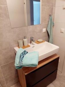 Koupelna v ubytování Eni-Time Mariazell mit Jakuzzi und Sauna