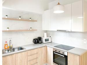 Kuchyňa alebo kuchynka v ubytovaní Harmonia ANhome Premium Selections
