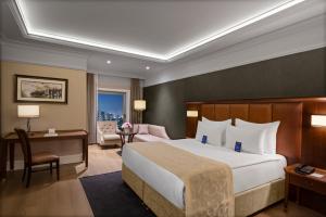 Tempat tidur dalam kamar di Rotta Hotel Istanbul