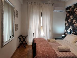 Posteľ alebo postele v izbe v ubytovaní Stunning apartment in the heart of Athens