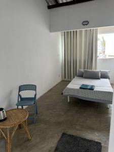 A bed or beds in a room at Dip N Doze