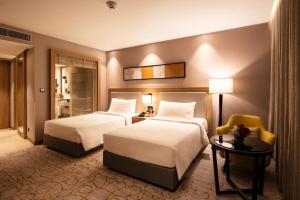 Letto o letti in una camera di LYFE HOTEL