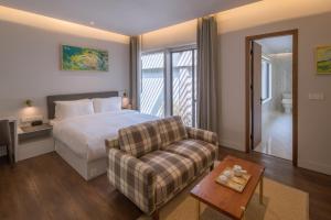Tempat tidur dalam kamar di Wuyu Hotel Chongqing Zoo & Yangjiaping The Mixc Light rail