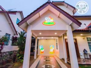 a house with a hello kitty sign on the front at JB Town Villa by JBcity Home in Johor Bahru