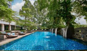 Swimmingpoolen hos eller tæt på Delonix Hotel Karawang