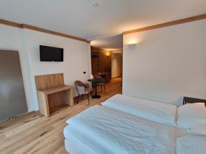 Postel nebo postele na pokoji v ubytování Hotel Ideal
