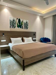 Katil atau katil-katil dalam bilik di Flock Hotel I Golf Course Road Near Dlf Phase 1 Metro station I Gurugram